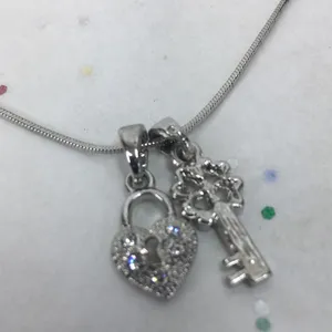 Lock & Key crystal charm silver tone necklace 18” thumbnail 1