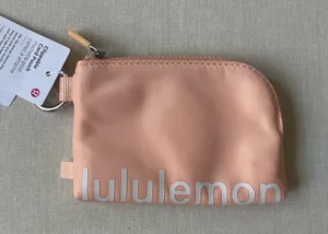 Lululemon Clippable Card Pouch - Peach Bellini thumbnail 1