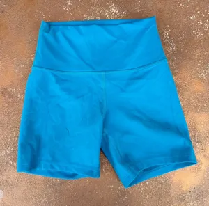 Lululemon Wunder Train High-Rise Biker Short 5in sz 4 / basically new thumbnail 1