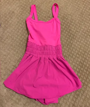 Women’s pink tennis romper thumbnail 1