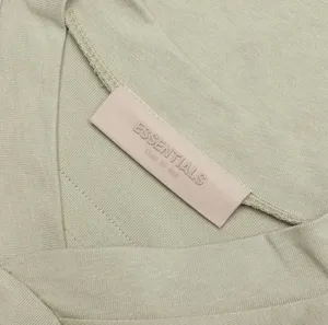Fear of God Essentials - Women’s Short Sleeve Football Tee thumbnail 9