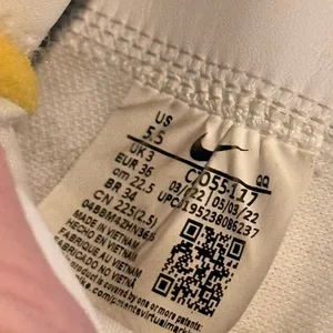 Nike White and Yellow High-Top Athletic Shoes thumbnail 3