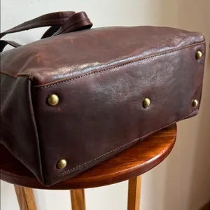 Antonio Valeria is a former Spacious Brown Leather Tote with Minimalist Design thumbnail 5