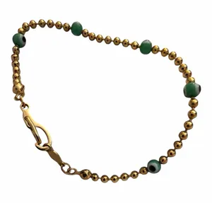 Gold Beaded Bracelet with Green Evil Eye Accent Beads thumbnail 1