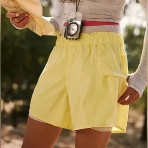 NWT Free People FP Movement Women's In The Wild Shorts Glow Yellow Size Medium thumbnail 1