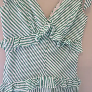 BCBGeneration Green and White Striped V-Neck Tie Shoulder Dress thumbnail 3