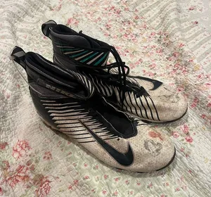 Nike men’s Black and Cream High-Top Athletic Cleats thumbnail 1