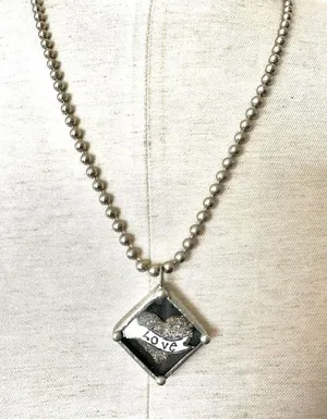 Silver tone love pendant necklace thumbnail 1