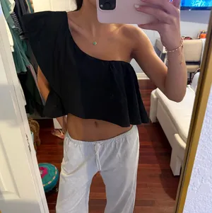 Chic Black Asymmetrical Flowy Top thumbnail 1
