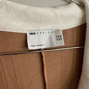 ASOS Design Contrast Collar Oversized Rib Romper In Brown thumbnail 6