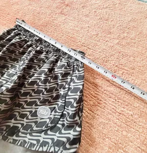 Nike Women’s M Dri-FIT Tempo Running Shorts Black Gray Print thumbnail 6