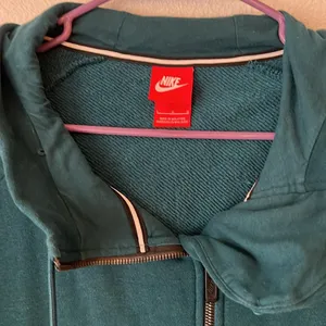 Nike Women’s Full Zip Asymmetrical Modern Cape Jacket Hoodie Teal Size Large thumbnail 2