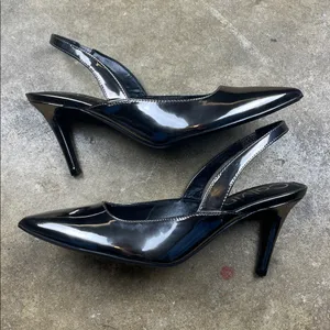 Calvin Klein Metallic Slingback Heels
Size: 9 thumbnail 3