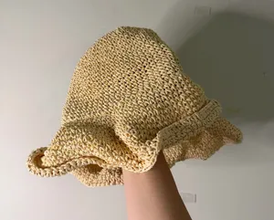 Handwoven Straw Bucket Hat in Pale Yellow thumbnail 1