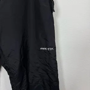 Arctix Women’s Classic Insulated Snow Pants in Black Size S thumbnail 3