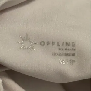Aerie Offline Real Me Crossover Waist Flowy Shorts in White thumbnail 4
