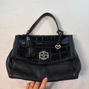 Brighton black leather handbag. 2 pockets with charm, tassel, woven handle thumbnail 2