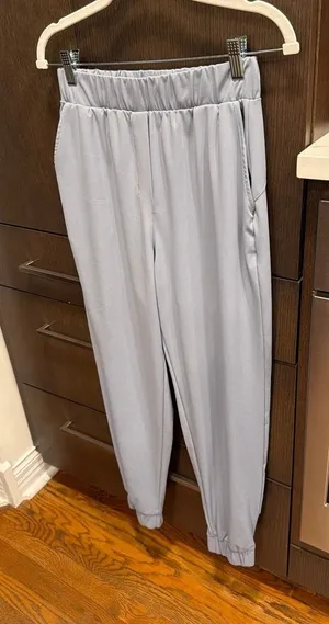 LULULEMON STRETCH ELASTIC blue HEM ANKLE‎ ZIP POCKET UNLINED PULL women's 10 thumbnail 1