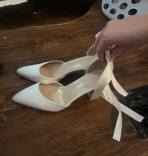 Ladies white satin heels with bow detail thumbnail 1