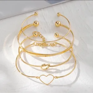 Set of 4 Stackable Gold Bracelets, Love Knot Bracelets and Heart boho jewelry thumbnail 2