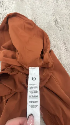 Lululemon Fast and Free High-Rise Tights in the color Dark Terracotta or Butternut Brown. thumbnail 4