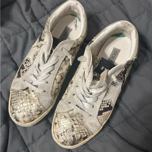 Steve Madden Beige and Black Snake Print Star Sneakers thumbnail 1