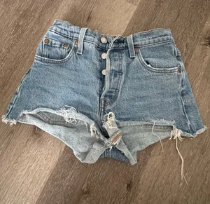 Levi's 501 Original Distressed Cutoff Denim Shorts Medium Wash W23 thumbnail 1