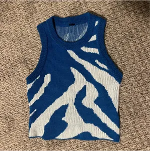 Tank top sweater, soft, blue and white pattern, size medium, no tags, from Amazon, worn once, stretchy thumbnail 1