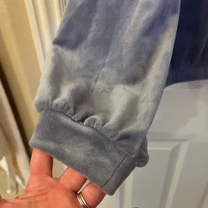 UGG Shanara Velvet Crew Neck Sweatshirt in the color Cloudy Grey. Large thumbnail 6