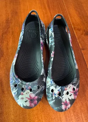 CROCS Floral Black Slip-On Flats with Pink & White Blooms thumbnail 1