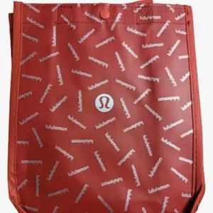 Lululemon reusable shopping bag.
Button closure. thumbnail 1