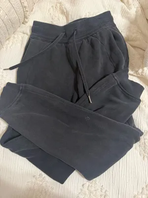 Lululemon black sweatpants / joggers with drawstring waist and tapered fit #athleisure #yoga thumbnail 1