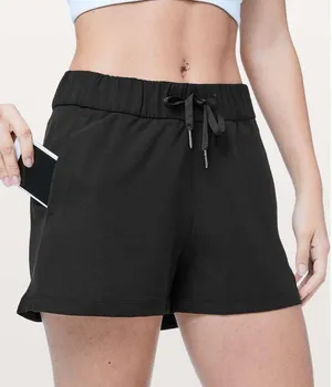 Lululemon • On The Fly Short *Woven *2.5" black drawstring pull-on travel thumbnail 1