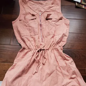 Tan color romper size small never worn very lightweight material zipper in the f thumbnail 1