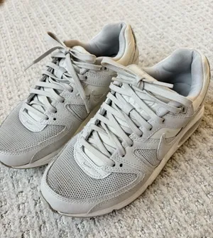 Nike women’s Athletic Sneakers in Light Gray thumbnail 1
