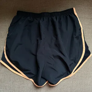 Nike running shorts black and orange thumbnail 2