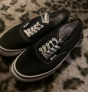 Vans Black Canvas Low-Top Sneakers with White Accents thumbnail 1