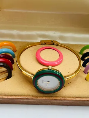 Gucci Gold Bangle Watch with beautiful bezels💛💙💚❤️💜🩵 thumbnail 3