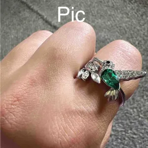 Elegant Silver Tone Hummingbird Rhinestone Ring with Green Gemstone thumbnail 4