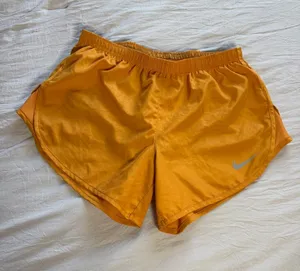 Nike Women's‎ Bright Orange Athletic Running Shorts thumbnail 1
