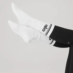 ALO Yoga - Unisex Throwback Crew Socks in White w/Black Logo thumbnail 2
