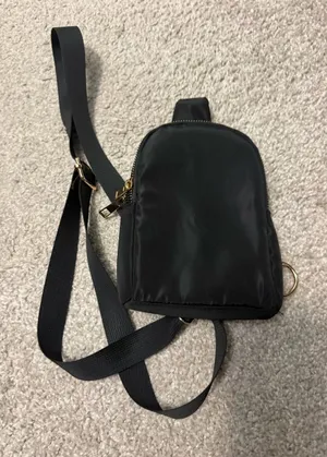 Amazon Black Nylon Mini Sling Backpack NWOT thumbnail 1