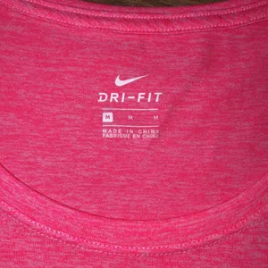 𝅺Nike Dri fit medium pink athletic top thumbnail 2