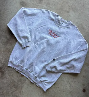 Passion Brand crewneck sweatshirt features a distinct red embroidered cursive script reading "The Desire of Our Souls" across the chest thumbnail 1