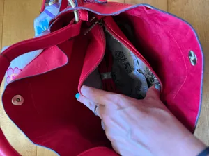 Red hobo shoulder bag featuring a braided strap thumbnail 3