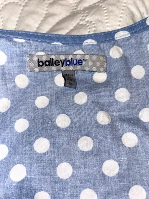 Bailey blue vintage-style short dress with white polka dot print on a light blue background. XL thumbnail 4