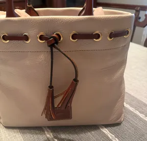 Dooney & Bourke Cream Leather Drawstring Tote with Brown Trim thumbnail 1