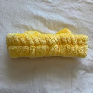 Yellow fuzzy face washing headband thumbnail 2