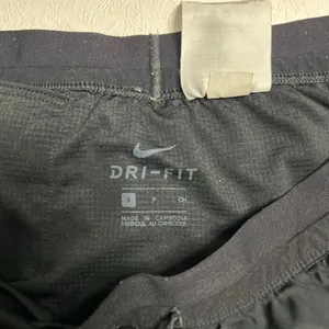 Nike Dri-FIT Black Running Shorts Reflective Logo Men’s Size Small thumbnail 3