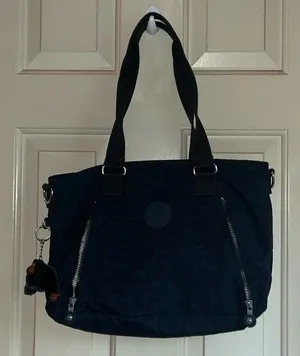 NOT FOR SALE. Kipling black bag with keychain , and extra strap. thumbnail 1